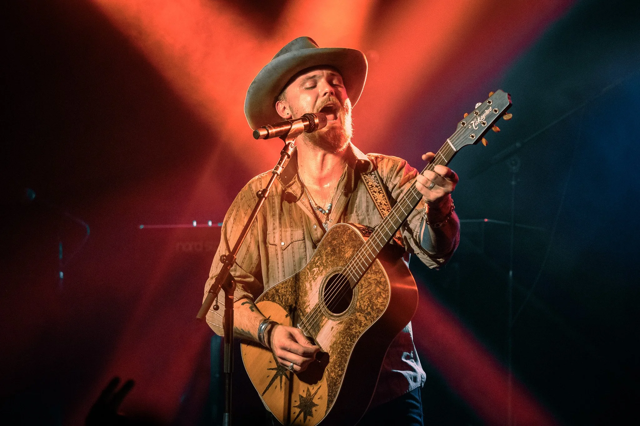 Jackson Dean performing on tour
